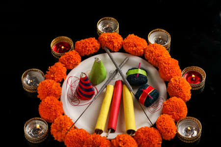 fire crackers,lamp and flower on dark background , Indian festival Diwaliの写真素材