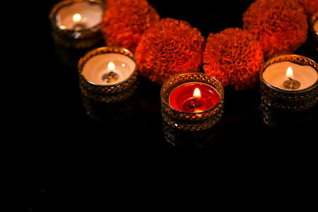 Indian Festival Diwali , oil lamp and flower design on dark backgroundの写真素材
