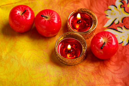 Indian festival Diwali , Glowing apple shape candleの写真素材