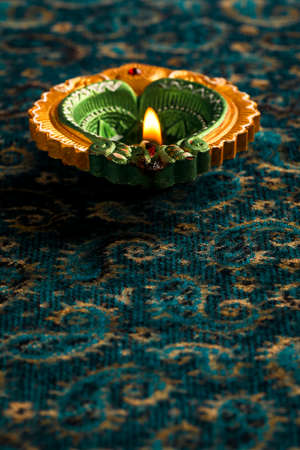 Indian Festival Diwali , oil lamp on dark backgroundの写真素材