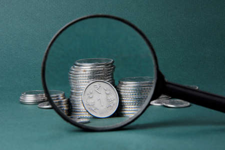 Magnifying glass with indian money, Indian currency,Rupee indian currency,money concept.の写真素材