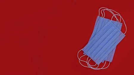 Surgical mask with rubber ear straps. Typical 3-ply surgical mask to cover the mouth and nose....