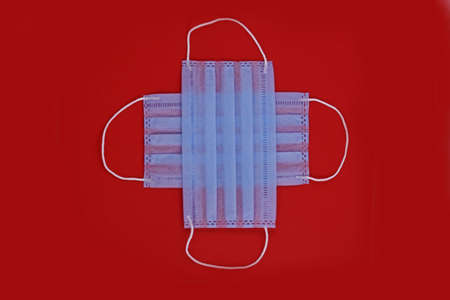 Surgical mask with rubber ear straps. Typical 3-ply surgical mask to cover the mouth and nose....
