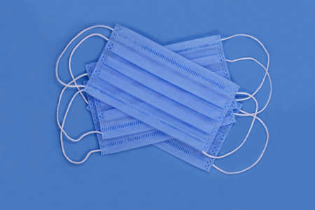 Surgical mask with rubber ear straps. Typical 3-ply surgical mask to cover the mouth and nose....