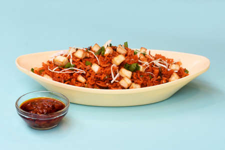 Schezwan paneer fried rice with schezwan sauce,Chinese fried rice with paneer,indo-chinese cuisine dishes. selective focusの写真素材