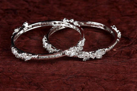 Diamond bracelet on textured background, diamond jewellery, diamond bangles,diamond jewelry