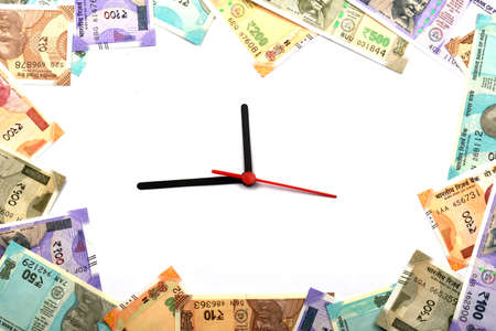 Time is Money,Time and money concept, Indian Currency, Rupee, Indian Rupee,Indian Money, Business, finance, investment, saving and corruption concept - Imageの写真素材