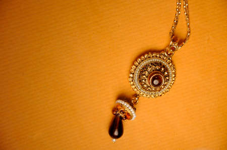 Diamond and stones pendant with gold chain, Indian Traditional Jewelleryの写真素材