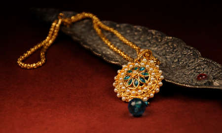 Pearl pendant with gold chain, Indian Traditional Jewelleryの写真素材