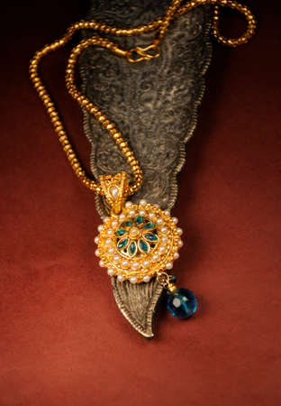 Pearl pendant with gold chain, Indian Traditional Jewelleryの写真素材