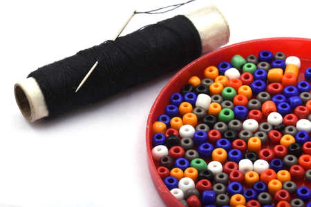 Color beads with needle.used in finishing fashion clothes. make bead necklace, beads for women of...