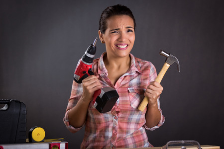 woman carpenter with confused face