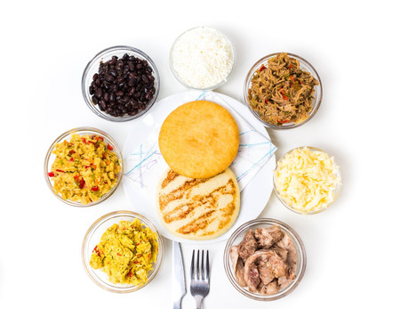 Venezuelan typical food, arepas and their different combinations. Chicken, fish, meat, cheese, black beans and pork.の写真素材