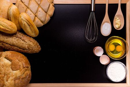 Ingredients and utensils for bakery black background