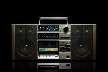 Silver Radio Cassette on black backgroundの写真素材