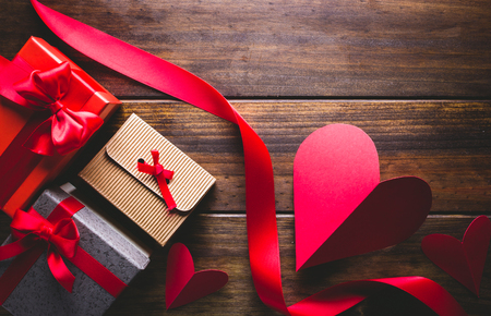 Valentine's gifts on a wooden background.の写真素材