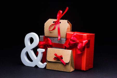 gift boxes and envelopes on a black backgroundの写真素材