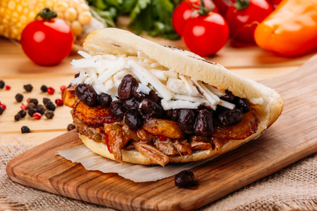 The typical Venezuelan Arepa called Pabellon, which has seasoned minced meat, fried plantain, black beans and white cheeseの写真素材