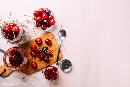 Top view of homemade cherry marmalade preparation, sweet food