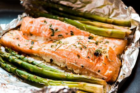 Salmon fillet cooked with asparagusの写真素材