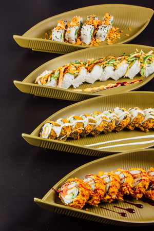 A diverse selection of delicious Japanese sushi rollsの写真素材