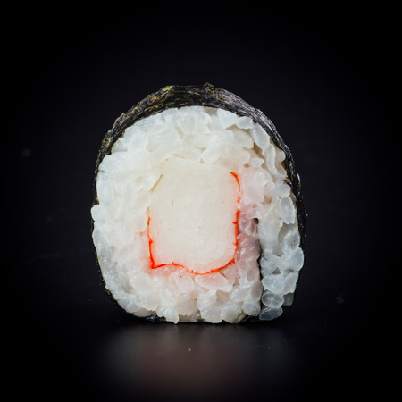 Surimi maki sushi rolls on a black background, japanese foodの写真素材