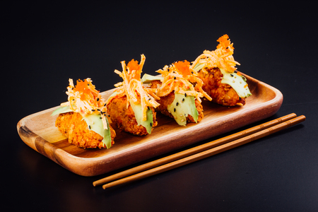 Japanese food, salmon croquettes on a black backgroundの写真素材