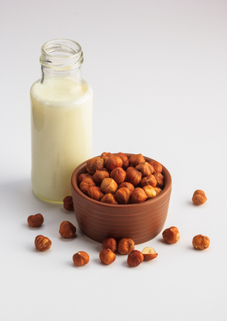 Hazelnut milk isolated on a white background, vegan milkの写真素材