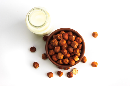 Hazelnut milk isolated on a white background, vegan milkの写真素材