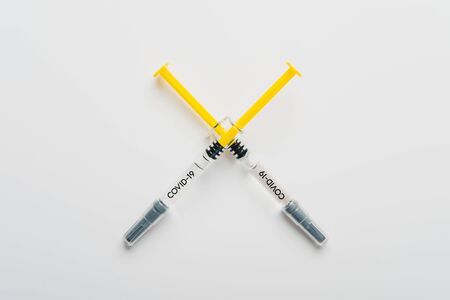 Coronavirus Vaccine, Corona virus Vaccine concept with syringe and
antidote on white background. Vaccine Concept of fight against coronavirus.の写真素材