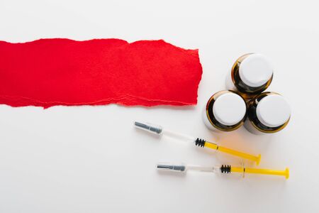 Coronavirus Vaccine, Corona virus Vaccine concept with syringe and
antidote on white background. Vaccine Concept of fight against coronavirus.の写真素材