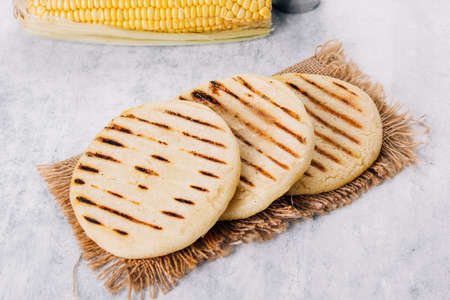 Arepas made with corn flour and cooked in a pan, it is similar to a corn tortillaの写真素材