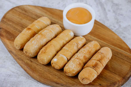 Fried tequeÃ±os, fingers stuffed with salty artisanal cheese, typical Venezuelan and Latin American foodの写真素材