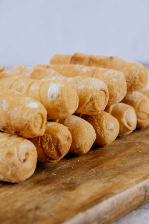 Fried tequeÃ±os, fingers stuffed with salty artisanal cheese, typical Venezuelan and Latin...