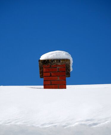 snow covered  chimneyの写真素材