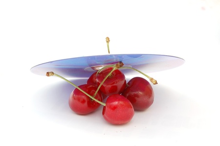 Sweet cherry covered  by dvd discの写真素材