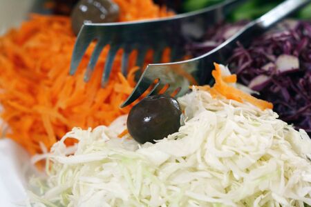 olive in cabbage  saladの写真素材