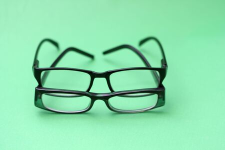 pair of glasses  on green の写真素材