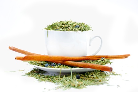 Herbal tea cup and cinnamon の写真素材