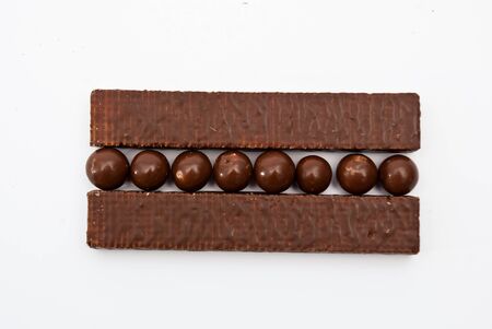 Dark brown Chocolate balls and sticksの写真素材