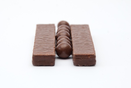 Dark brown Chocolate balls and sticksの写真素材