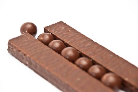 Dark brown Chocolate balls and sticksの写真素材