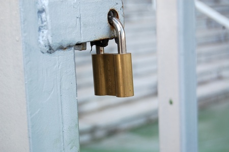 padlock on metal doorの写真素材