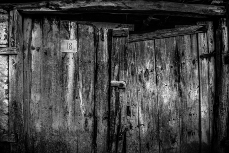 old wooden door black and whiteの写真素材