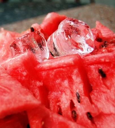 ice cubes on watermelon slicesの写真素材