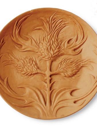 Tree on ceramic plateの写真素材