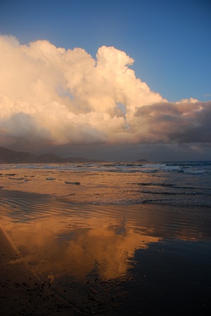 sunset on the beach in  greeceの写真素材