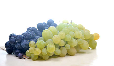 Bunch of ripe grapes on a white backgroundの写真素材