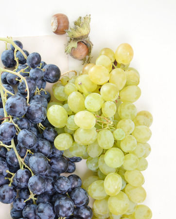 Bunch of ripe grapes on a white backgroundの写真素材