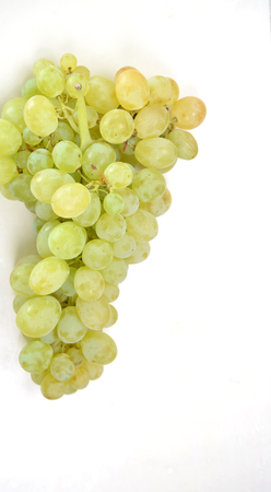 Bunch of ripe grapes on a white backgroundの写真素材